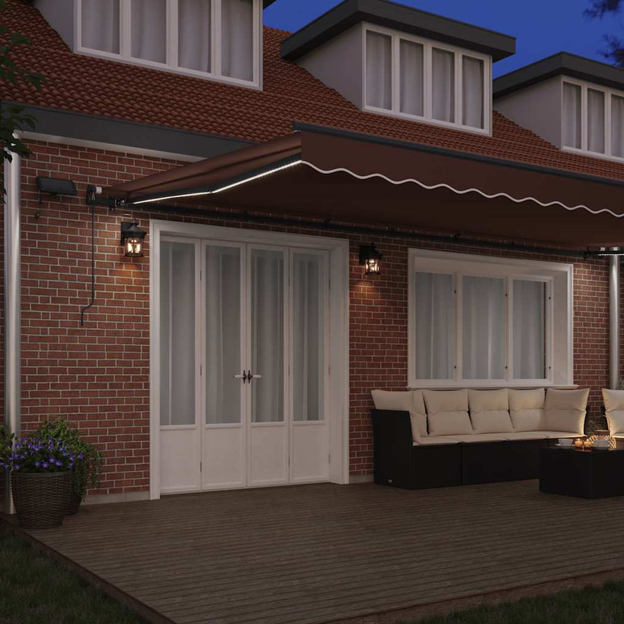 Luifel handmatig uittrekbaar met LED's 600x300 cm bruin