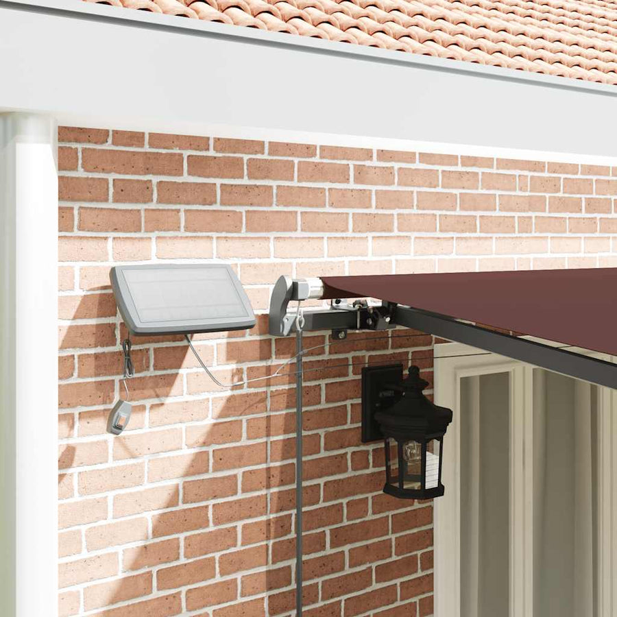Luifel handmatig uittrekbaar met LED's 600x300 cm bruin