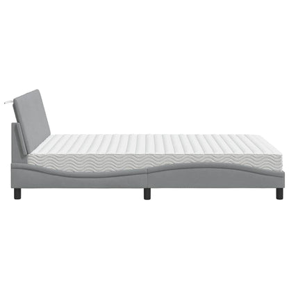 Bed met matras stof lichtgrijs 140x200 cm