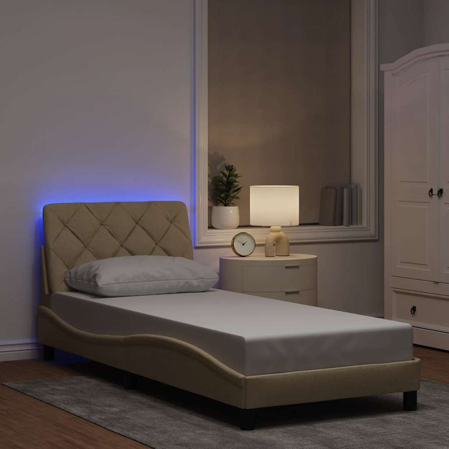 Bedframe met LED zonder matras 90x190 cm stof crèmekleurig