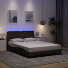 Bed frame with LED without mattress 120x200 cm fabric dark brown