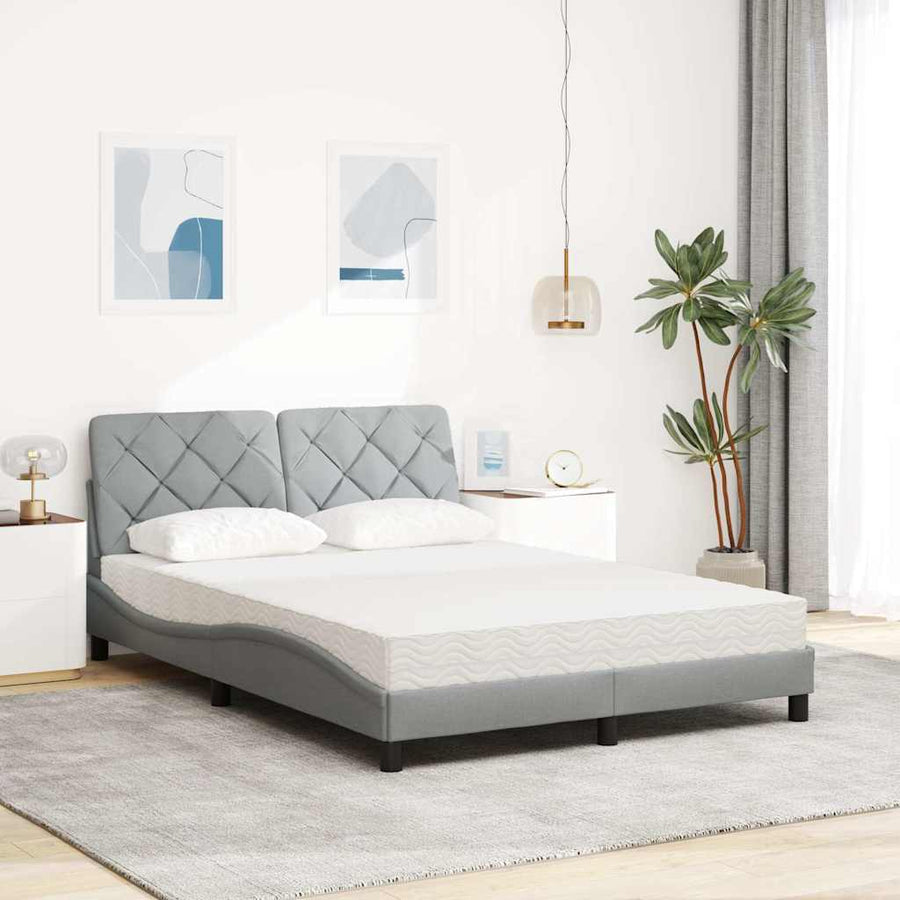 Bed met matras stof lichtgrijs 140x200 cm