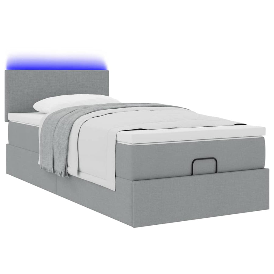 Ottoman bed met matras en LED's 80x200cm stof lichtgrijs