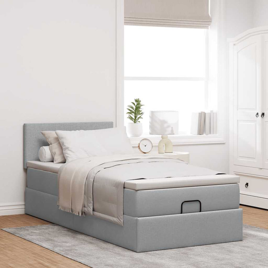 Ottoman bed met matras en LED's 80x200cm stof lichtgrijs