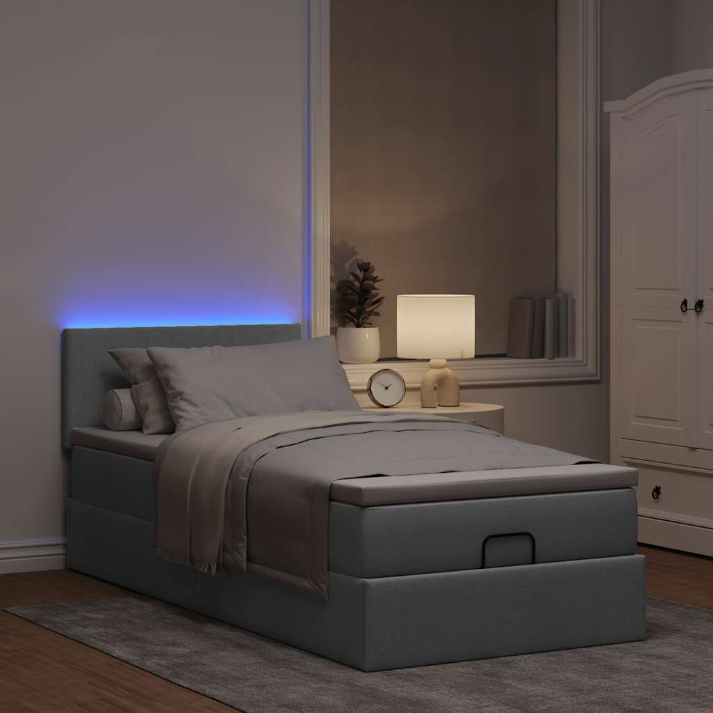 Ottoman bed met matras en LED's 80x200cm stof lichtgrijs