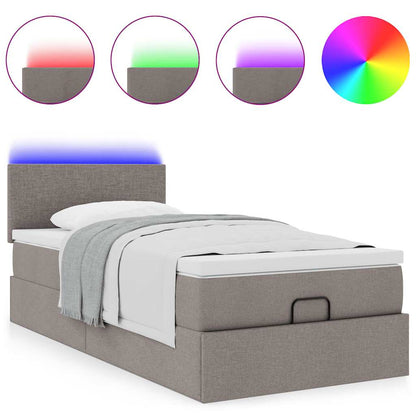 Ottoman bed met matras en LED's 80x200cm stof taupe