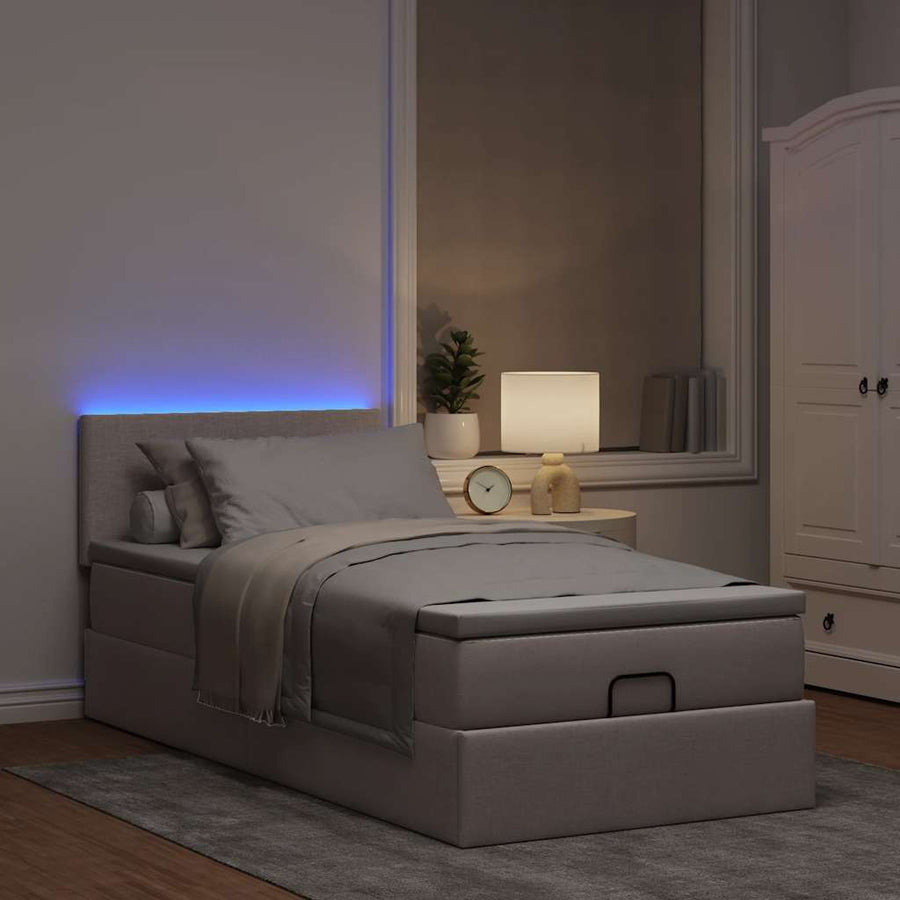 Ottoman bed met matras en LED's 80x200cm stof taupe