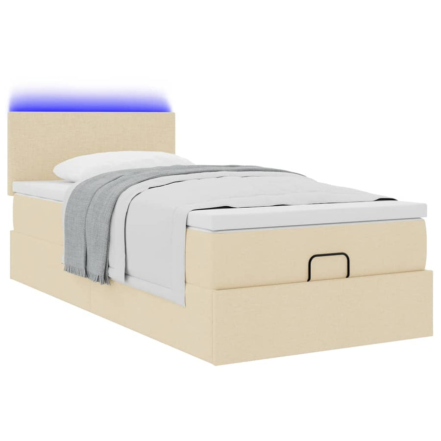 Ottoman bed met matras en LED's 80x200cm stof crèmekleurig