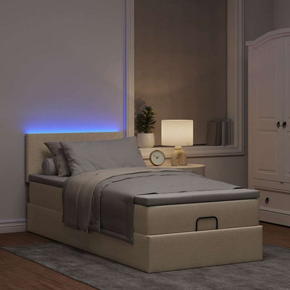 Ottoman bed met matras en LED's 90x190cm stof crèmekleurig