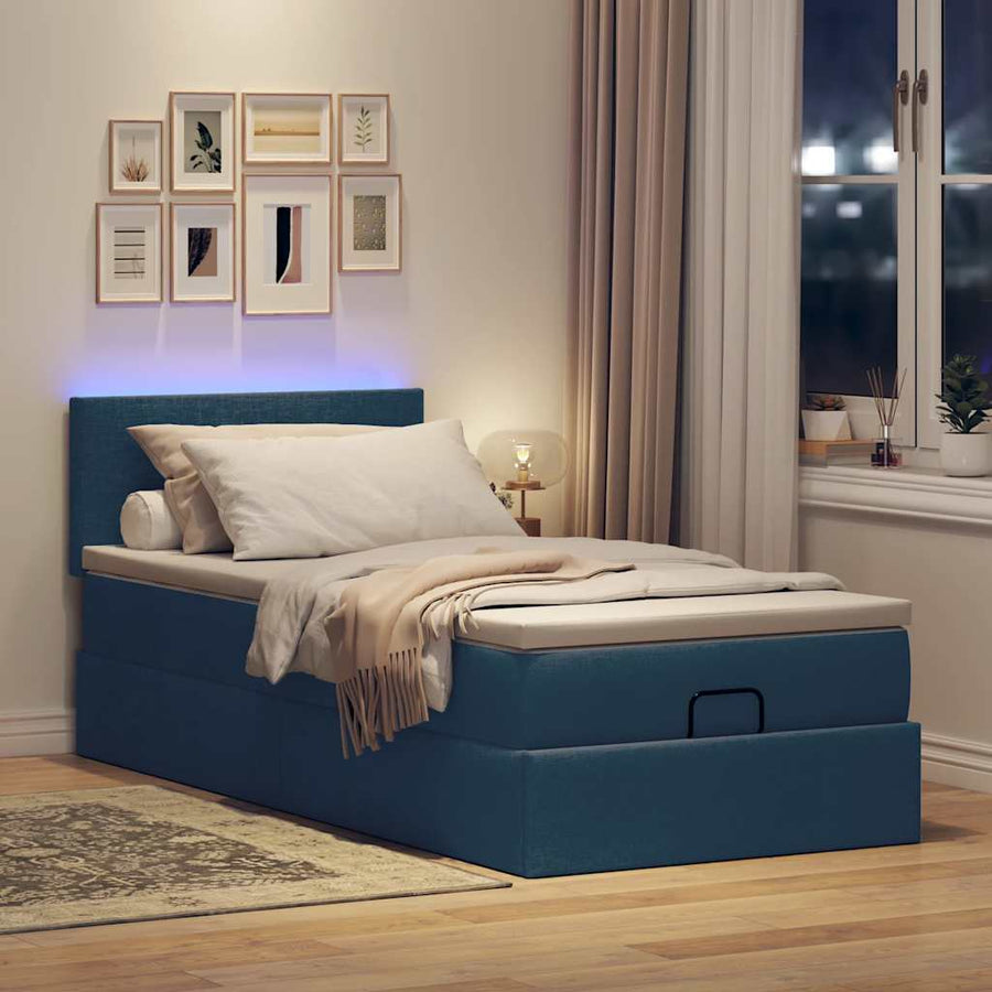 Ottoman bed met matras en LED's 90x190cm stof blauw