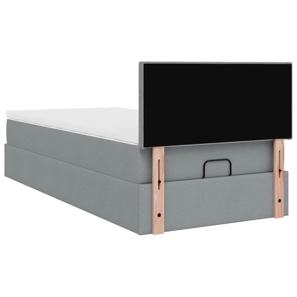 Ottoman bed met matras en LED's 90x200 cm stof lichtgrijs