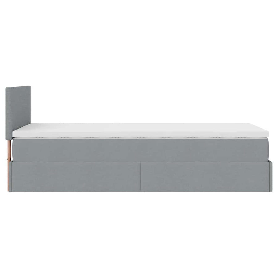 Ottoman bed met matras en LED's 100x200 cm stof lichtgrijs