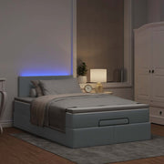 Ottomaans bed 120x190 cm lichtgrijs met matras en LED