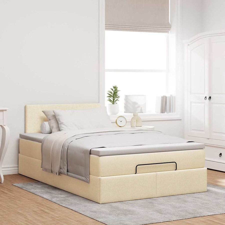 Ottoman bed met matras en LED's 120x190cm stof crèmekleurig