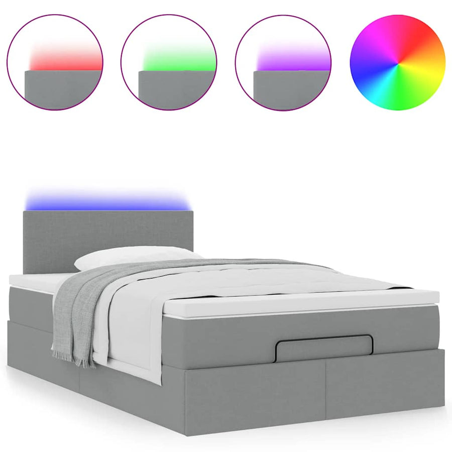 Ottoman bed met matras en LED's 120x200 cm stof lichtgrijs