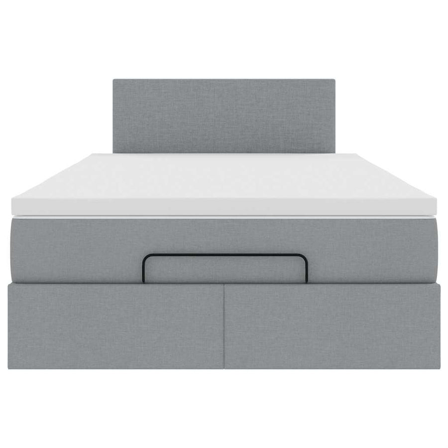 Ottoman bed met matras en LED's 120x200 cm stof lichtgrijs