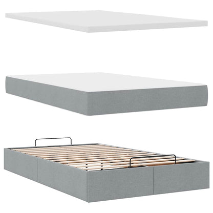 Ottoman bed met matras en LED's 120x200 cm stof lichtgrijs