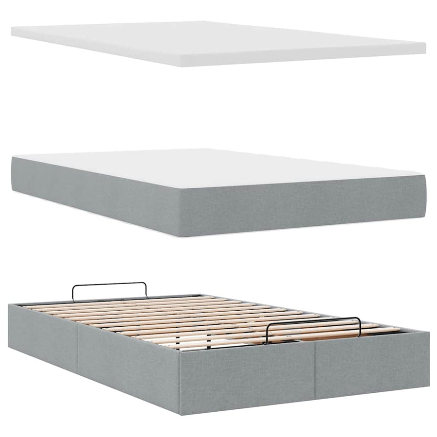 Ottoman bed met matras en LED's 120x200 cm stof lichtgrijs