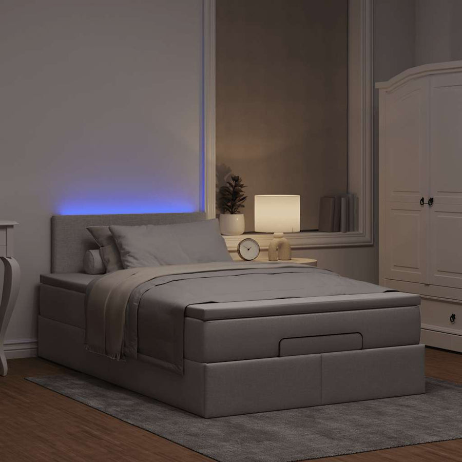 Ottoman bed met matras en LED's 120x200cm stof taupe