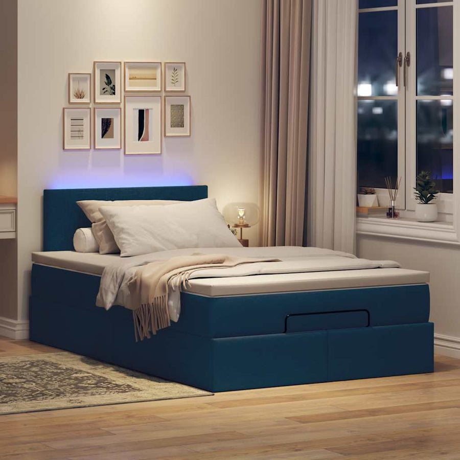 Ottoman bed met matras en LED's 120x200 cm stof blauw