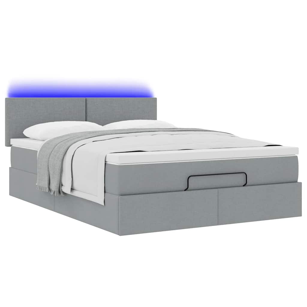 Ottoman bed met matras en LED's 140x200cm stof lichtgrijs