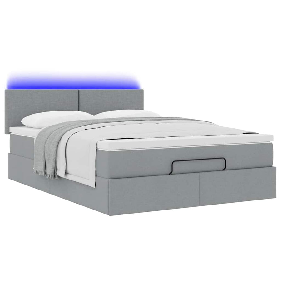 Ottoman bed met matras en LED's 140x200cm stof lichtgrijs