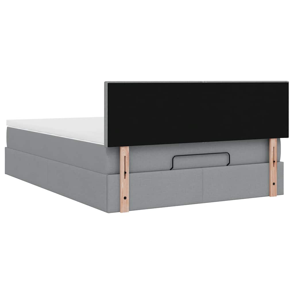 Ottoman bed met matras en LED's 140x200cm stof lichtgrijs