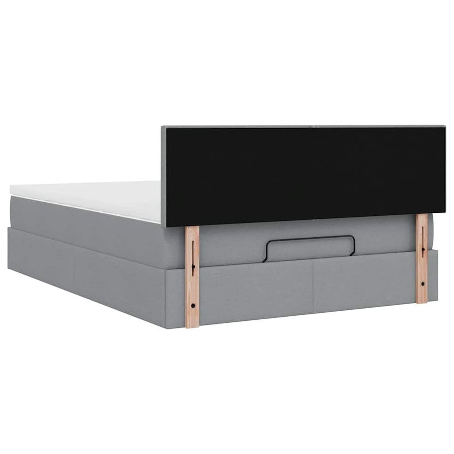 Ottoman bed met matras en LED's 140x200cm stof lichtgrijs