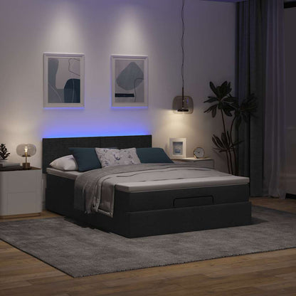 Ottoman bed met matras en LED's 140x200 cm stof zwart