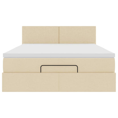 Ottoman bed met matras en LED's 140x200 cm stof crèmekleurig