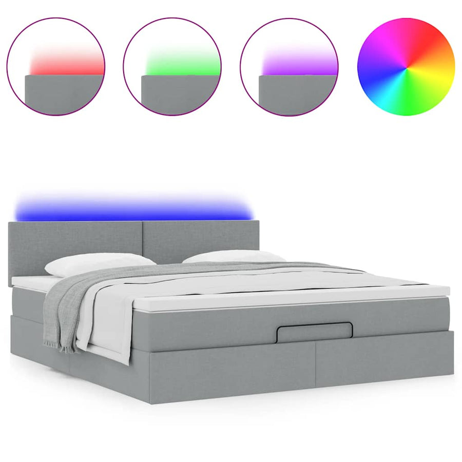 Ottoman bed met matras en LED's 160x200 cm stof lichtgrijs