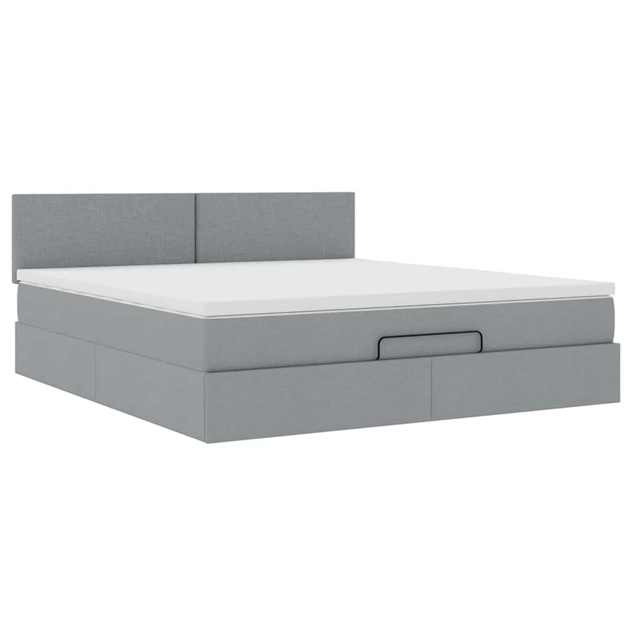 Ottoman bed met matras en LED's 160x200 cm stof lichtgrijs