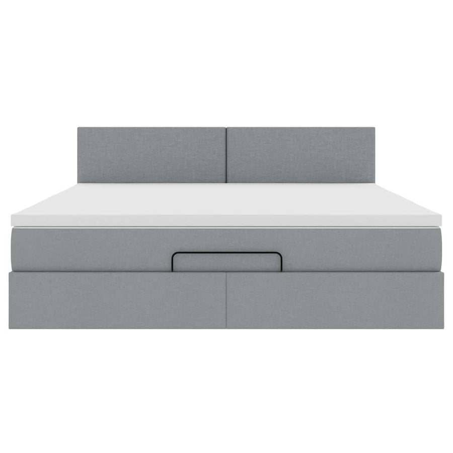 Ottoman bed met matras en LED's 160x200 cm stof lichtgrijs