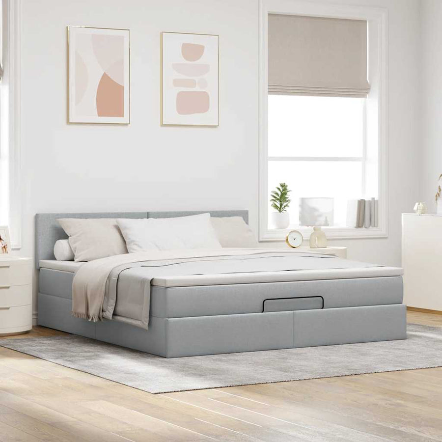 Ottoman bed met matras en LED's 180x200cm stof lichtgrijs