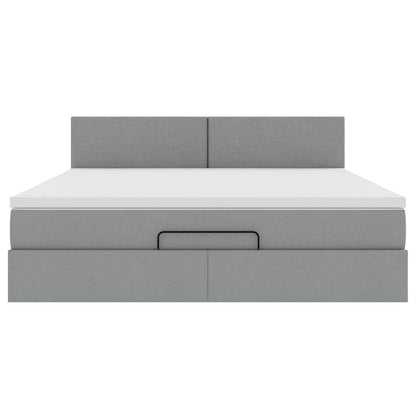 Ottoman bed met matras en LED's 180x200cm stof lichtgrijs