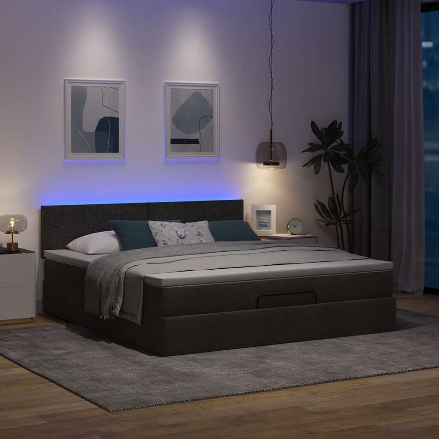Ottoman bed met matras en LED's 180x200cm stof zwart