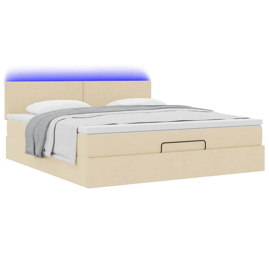 Ottoman bed met matras en LED's 180x200cm stof crèmekleurig