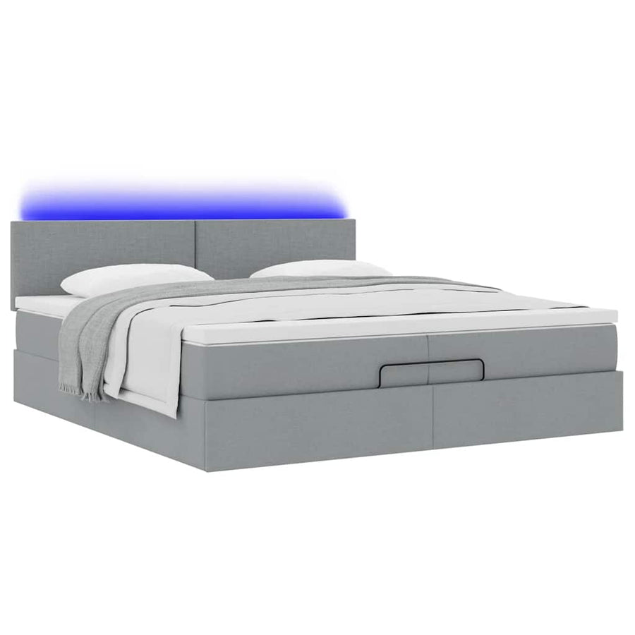 Ottoman bed met matrassen en LED's 200x200cm stof lichtgrijs