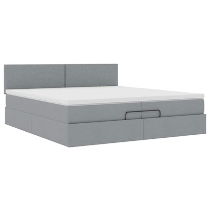 Ottoman bed met matrassen en LED's 200x200cm stof lichtgrijs