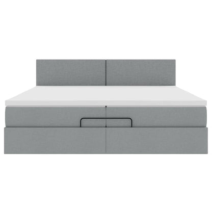 Ottoman bed met matrassen en LED's 200x200cm stof lichtgrijs