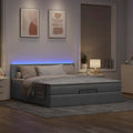Ottoman bed met matrassen en LED's 200x200cm stof lichtgrijs