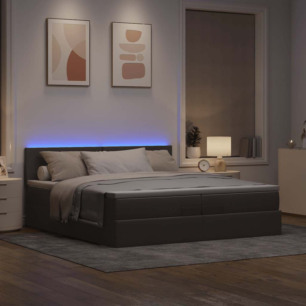 Ottoman bed met matrassen en LED's 200x200cm stof taupe