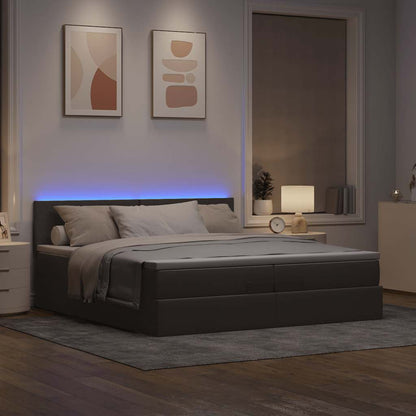 Ottoman bed met matrassen en LED's 200x200cm stof taupe