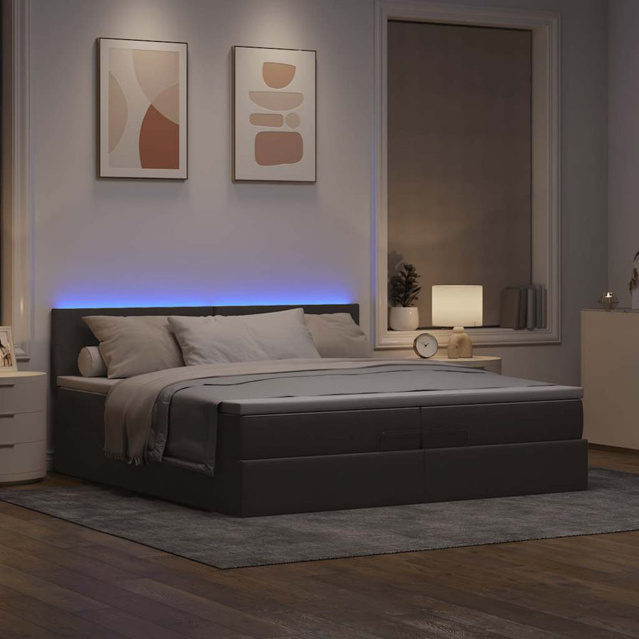 Ottoman bed met matrassen en LED's 200x200cm stof taupe