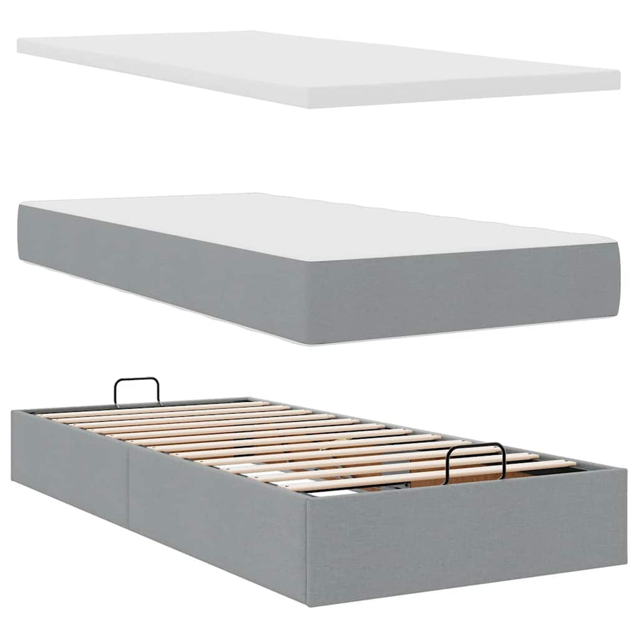 Ottoman bed met matras en LED's 80x200cm stof lichtgrijs