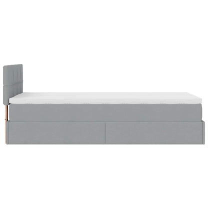 Ottoman bed met matras en LED's 80x200cm stof lichtgrijs