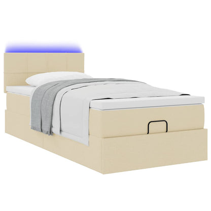 Ottoman bed met matras en LED's 80x200cm stof crèmekleurig