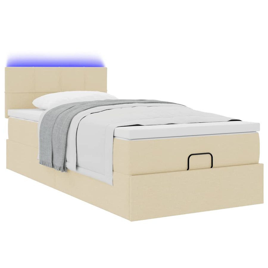 Ottoman bed met matras en LED's 80x200cm stof crèmekleurig