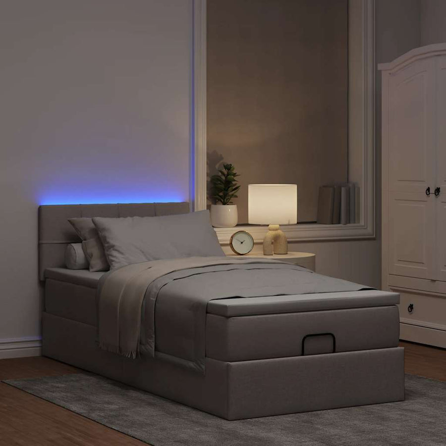 Ottoman bed met matras en LED's 90x190cm stof taupe