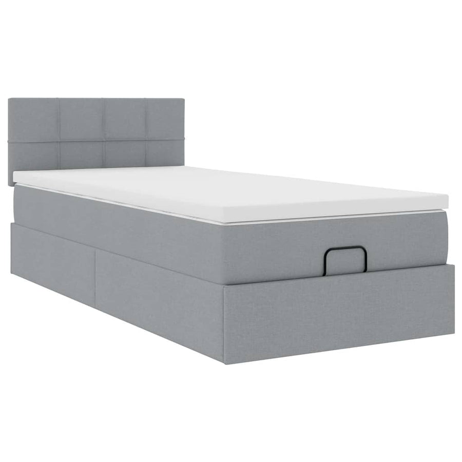 Ottoman bed met matras en LED's 90x200 cm stof lichtgrijs